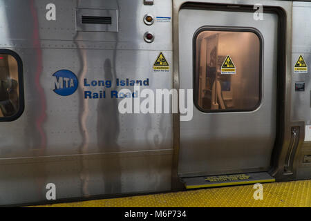 New York City, NY - Circa 2017: Long Island Railroad MTA train car side view. Largest commuter railway in North America taking passengers into Manhatt Stock Photo