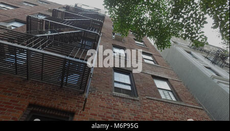 Straight up vertical view of generic apartment buildings during day ...