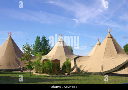 A group of traditional tipis in the nature