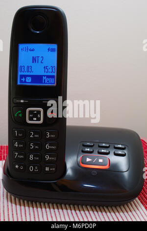 A cordless telephone with built in digital answering/message facility. Stock Photo