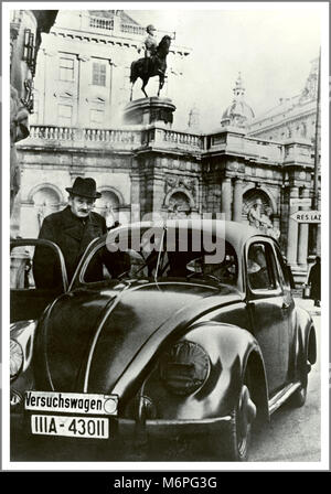 VW FERDINAND PORSCHE PROTOTYPE 1930’s VW VOLKSWAGEN LAUNCH KDF-WAGEN Rare Vintage 1938 image of prototype ‘ Versuchswagen’  ‘EXPERIMENTAL’  design Volkswagen Beetle car on driving test with its inspirational inventor and designer Dr Ferdinand Porsche Berlin Nazi Germany Stock Photo