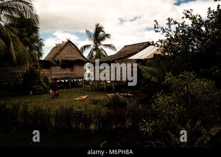 A traditional Islander's home, made from palm leaves and a wooden structure Stock Photo