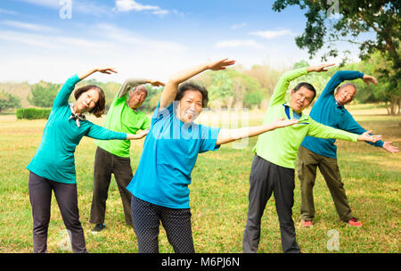 happy asian Senior Group Friends Exercise and   having fun Stock Photo