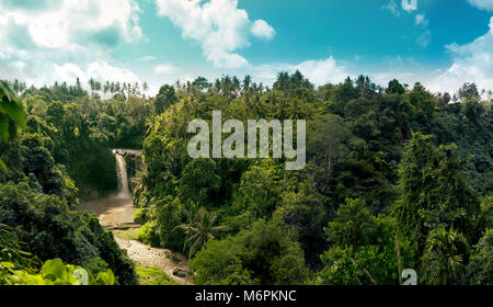 Waterfall panorama in amazonian tropical rainforest with big river in the middle of jungle Stock Photo
