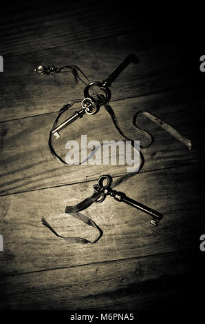 three keys on a ribbon Stock Photo