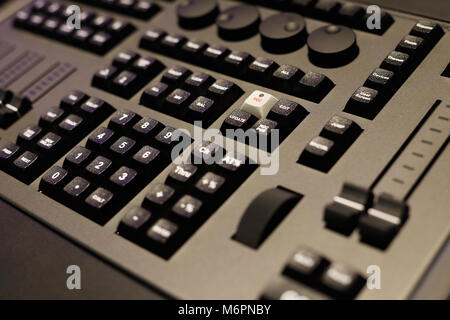 Closeup of the front panel of lighting control console. Selective focus. Stock Photo