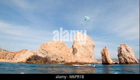 Parasailing above Los Arcos at Lands End in Cabo San Lucas Baja California Mexico BCS Stock Photo