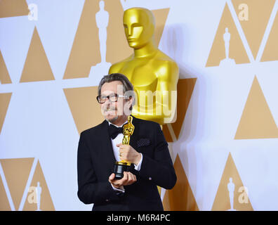 Gary Oldman winner of Best Actor for 'Darkest Hour' poses in the press room during the 90th Annual Academy Awards at Hollywood & Highland Center on March 4, 2018 in Hollywood, California. Stock Photo