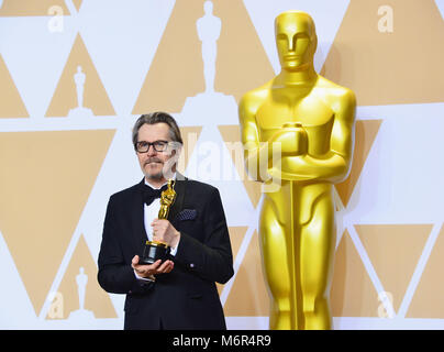 Gary Oldman winner of Best Actor for 'Darkest Hour' poses in the press room during the 90th Annual Academy Awards at Hollywood & Highland Center on March 4, 2018 in Hollywood, California. Stock Photo