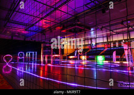 Hannover, Germany. 17th Feb, 2018. Long exposure shot showing the traces left by the lights of racing drones during the FPV tournament in Hannover, Germany, 17 February 2018. An FPV Racing Tournament is taking place in the Swiss Life Hall on the sidelines of the Dronevention Drone and Multicopter Festival. FPV or First Person View Racing pilots fly their special racing drones at high speed through a track while a video headset shows a live feed from the multicopter. Credit: Philipp von Ditfurth/dpa/Alamy Live News Stock Photo