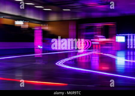 Hannover, Germany. 17th Feb, 2018. A racing drone flying past its pilot during the FPV tournament in Hannover, Germany, 17 February 2018. An FPV Racing Tournament is taking place in the Swiss Life Hall on the sidelines of the Dronevention Drone and Multicopter Festival. FPV or First Person View Racing pilots fly their special racing drones at high speed through a track while a video headset shows a live feed from the multicopter. Credit: Philipp von Ditfurth/dpa/Ģ����ý Live News Stock Photo