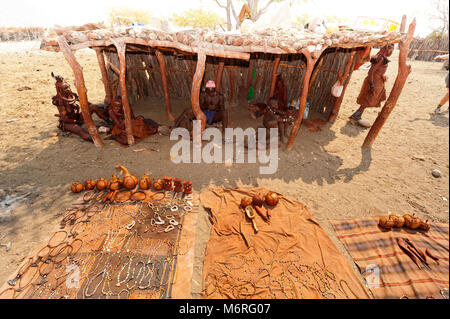 Craft stall exposition in a himba village to sell itens to tourists. The himbas live also in south Angola, where they are called hereros, Namibia Stock Photo