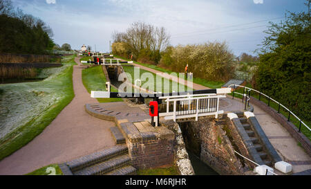 Foxton Locks are ten canal locks consisting of two 'staircases' each of five locks, located on the Leicester line of the Grand Union Canal about 5 km  Stock Photo