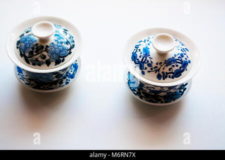 Two tea cups in a chinese style isolated on a white background Stock Photo