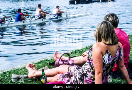 Watching rowers pass by at Henley-On-Thames, England. Stock Photo