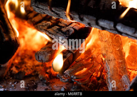Close up of firewood burning in fire hearth Stock Photo