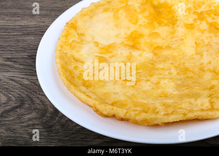 Indian bread on the plate in wood background Stock Photo