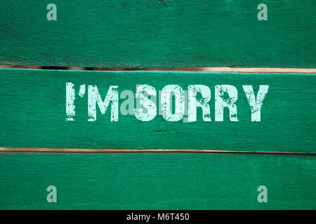 Concept I'm sorry- phrase written on old green background Stock Photo