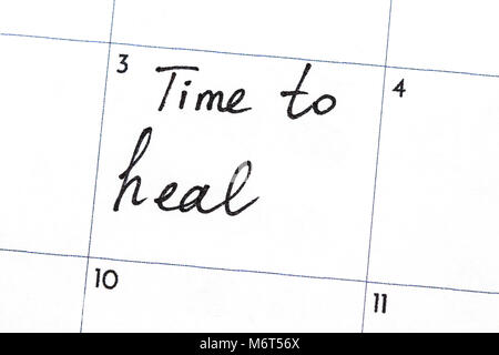 'time to heal' text write on calendar. Stock Photo