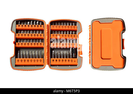Closeup of screwdrivers head set or replaceable bits and tool box isolated on white background. Stock Photo