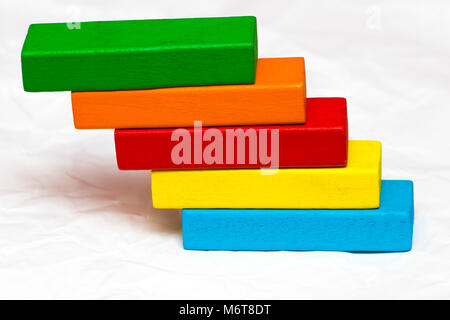 Wooden scale with colorful blocks isolated on white. Montessori toy ...
