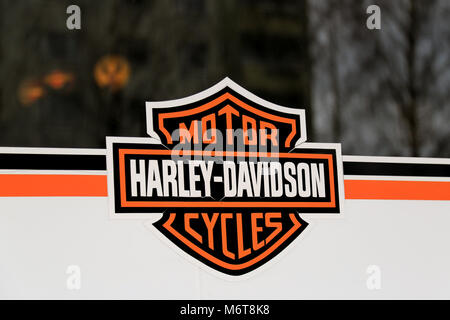 LOIMAA, FINLAND - MARCH 9, 2014: Weathered Sign Harley-Davidson Motorcycles on a store window. H-D delivers continued growth for fourth quarter and fu Stock Photo