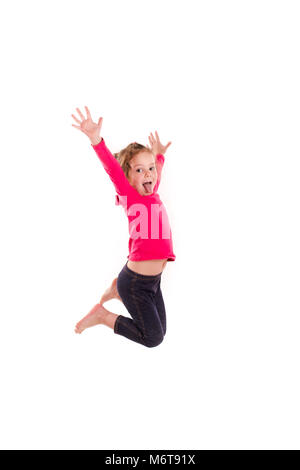 Active happy little girl jumping isolated on white Stock Photo