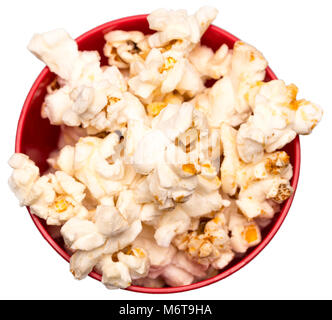 popcorn in a red bowl top view. Stock Photo