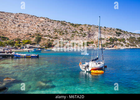 Zakynthos, Greece - August 20, 2016: Sailing yachts moored in Agios Nikolaos bay. Zakynthos, Greek resort island Stock Photo