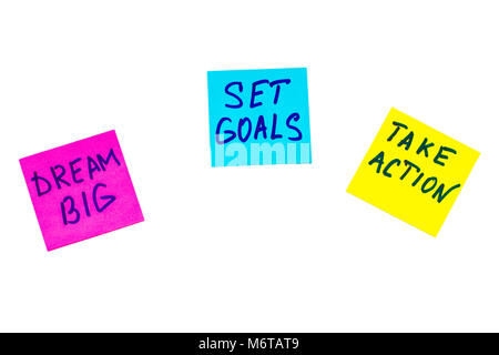 dream big, set goals, take action concept - motivational advice or reminder on colorful sticky notes isolated on white. Stock Photo