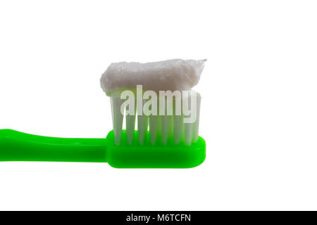 Toothbrush and toothpaste isolated on white background. Stock Photo