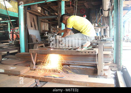 The welder working in the workshop Stock Photo