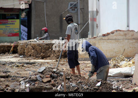 The mason was working during the day Stock Photo