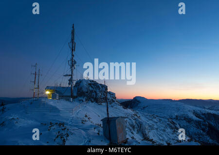 Ceahlau Toaca weather station in winter mountain landscape. Romania Stock Photo