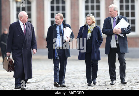 (Left-right) Senior Counsel Michael McDowell, Garda Sergeant Maurice McCabe, wife Lorraine and solicitor Sean Costello arrive to give evidence at the Disclosures Tribunal in Dublin Castle. Stock Photo