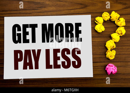 Hand writing text caption inspiration showing Get More Pay Less. Business concept for Budget Slogan Concept written on white paper on the wooden backg Stock Photo