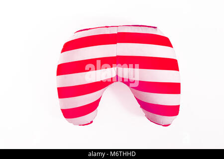 colored striped road travel pillow isolated on white background. Stock Photo