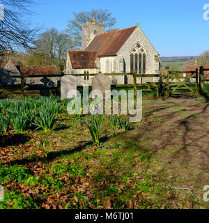 Early spring morning light on St Michael's Church at Chalton on the South Downs in Hampshire, UK Stock Photo