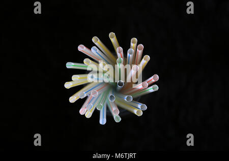Non- biodegradable plastic drinking straws. Stock Photo