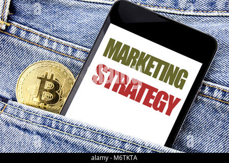 Conceptual hand writing text caption inspiration showing Marketing Strategy. Business concept for Success Digital Plan Written phone mobile phone, cel Stock Photo