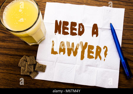 Handwriting Announcement text showing Need A Lawyer. Business concept for Advocacy Justice Help written on tissue paper on wooden background with pen  Stock Photo