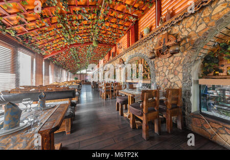 MOSCOW - JULY 2014: The interior of the enclosed porch of the restaurant 'VODOPAD' Stock Photo