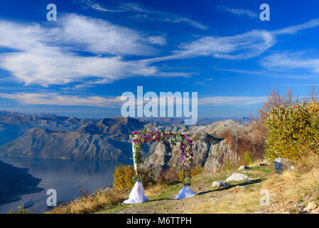 wedding arch with flowers on the background of the mountains Stock Photo