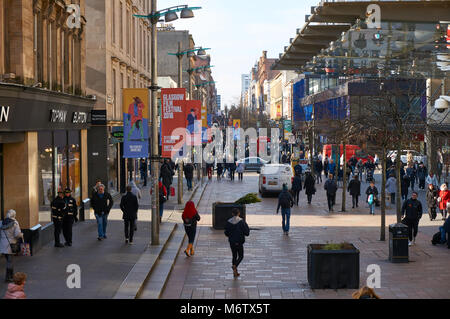 Sauchiehall street in Glasgow city center busy with shoppers on a sunny morning. Stock Photo