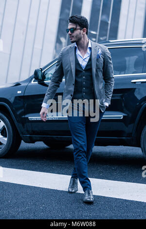 Men in suit with his luxury 4x4 Stock Photo