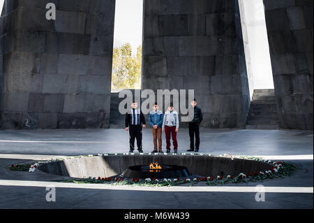 Young lads visiting the Tsitsernakaberd Armenian Genocide memorial complex in Yerevan,Armenia Stock Photo