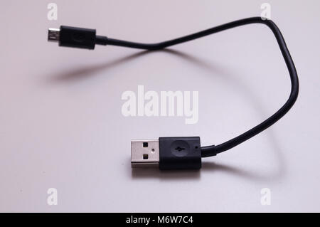USB and micro USB connector cable. Micro-USB cable connector on white background Stock Photo