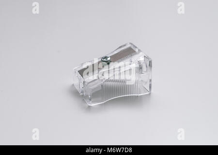 Transparent Pencil Sharpener. Photo of one pencil-sharpener on a white background Stock Photo