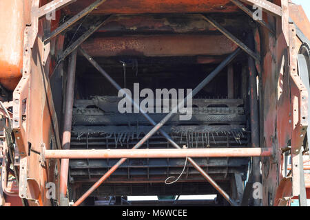 Old rusty disassembled combine harvester. Combine harvesters Agricultural machinery Stock Photo