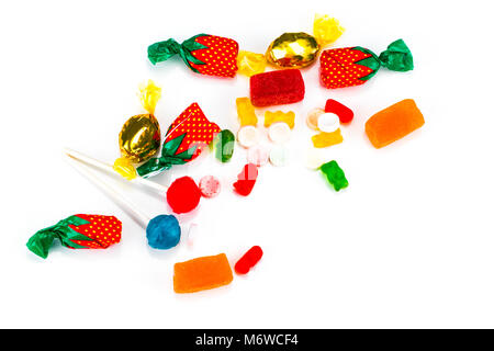 Colorful candies and lollipops isolated over white background. Stock Photo